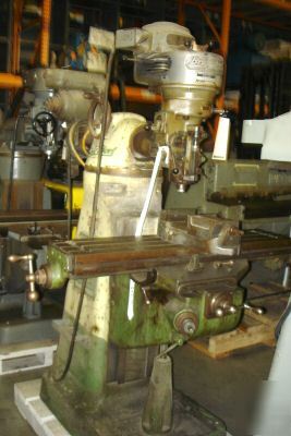 Bridgeport vertical mill w/ shapping attach. table 9X42