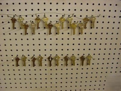 Locksmith, keys, key blanks, peg board hooks