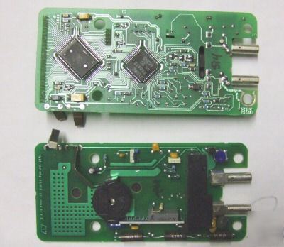Two fluke multimeter tester pcb board 1X-3001 rev u
