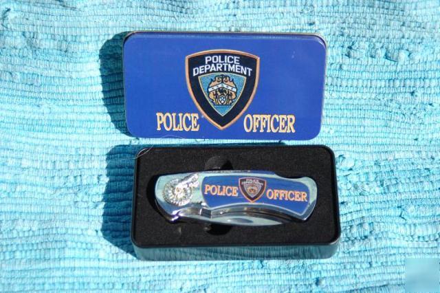 Police office/police department knife in metal tin