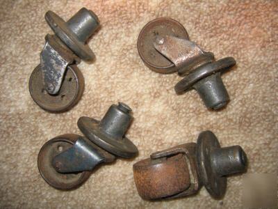 Set of 4 old vintage heavy duty iron casters antique
