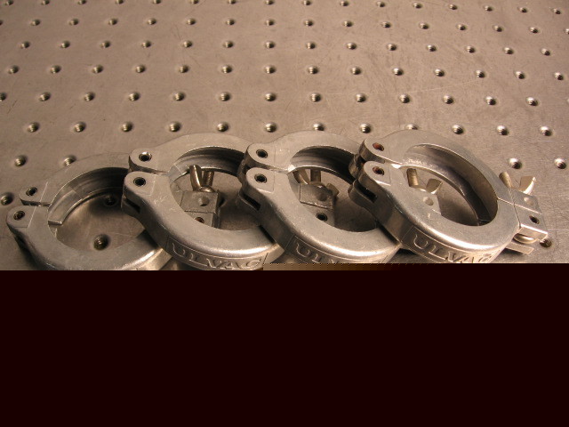G23545 four ulvac vacuum flange clamps