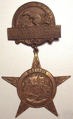 Rare 1912 minnesota conservation & agriculture badge