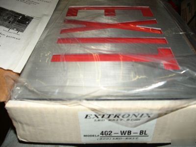 New exitronix 402-wb-bl led emergency exit sign in box